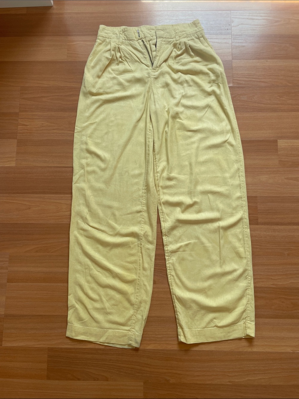 Women yellow trouser flowy pants.